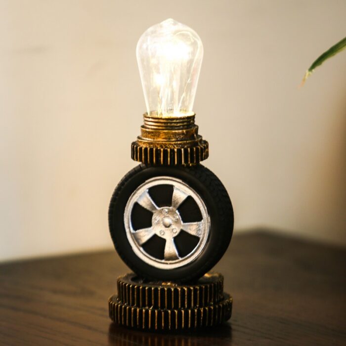 1013111_67da2b875bc75 تحفة مكتب على شكل إطار سيارة مع انارة - الصورة 1