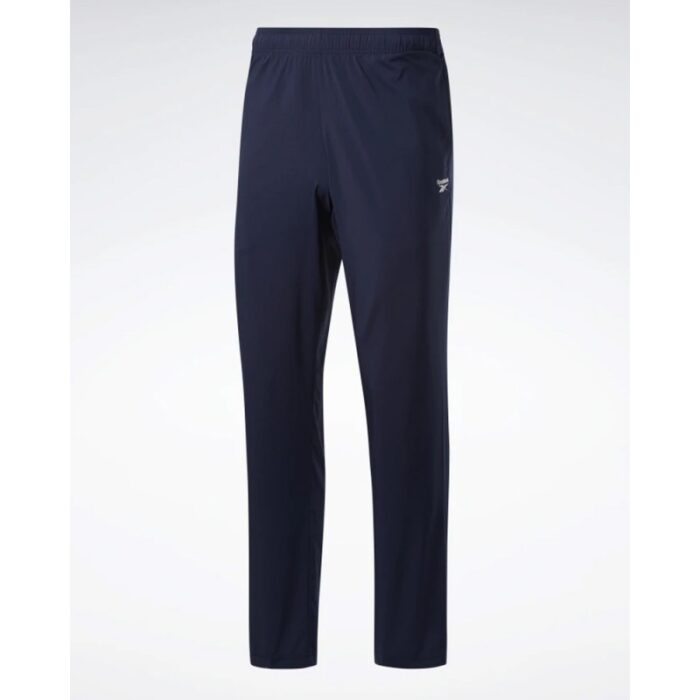 ⁦بنطلون ريبوك ويفن انلاين للرجال لون كحلي - Reebok Men's Training Essentials Woven Unlined Pants - Navy⁩ - الصورة ⁦2⁩