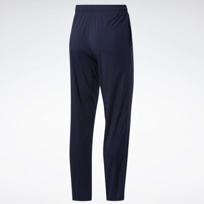 ⁦بنطلون ريبوك ويفن انلاين للرجال لون كحلي - Reebok Men's Training Essentials Woven Unlined Pants - Navy⁩ - الصورة ⁦3⁩