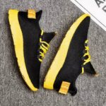 حذاء سبورت شبابي لون أسود  ونعل أصفر