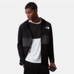 The North Face Men's Mountain Athletics Overlay Jacket -  جاكيت ذا نورث فيس مونتين اثليتيك اوفرلي للرجال لون أسود ورمادي