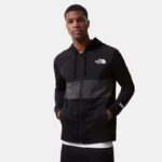 ⁦The North Face Men's Mountain Athletics Overlay Jacket -  جاكيت ذا نورث فيس مونتين اثليتيك اوفرلي للرجال لون أسود ورمادي⁩ - الصورة ⁦4⁩