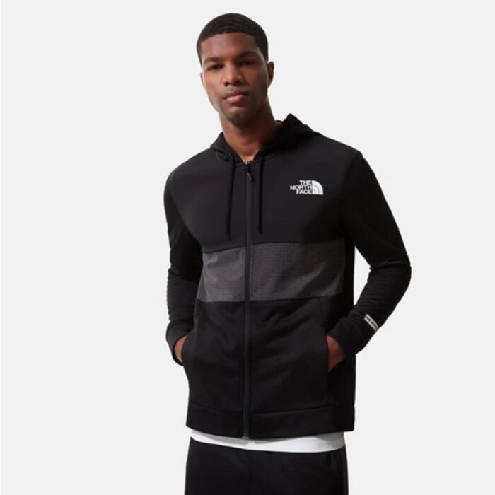 ⁦The North Face Men's Mountain Athletics Overlay Jacket -  جاكيت ذا نورث فيس مونتين اثليتيك اوفرلي للرجال لون أسود ورمادي⁩ - الصورة ⁦4⁩