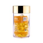 مرتبان كبسولات فيتامينات اللون الاصفر للنعومه ولمعان الشعر