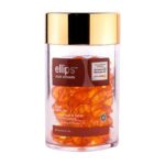 مرتبان كبسولات فيتامينات اللون البني لحيوية الشعر