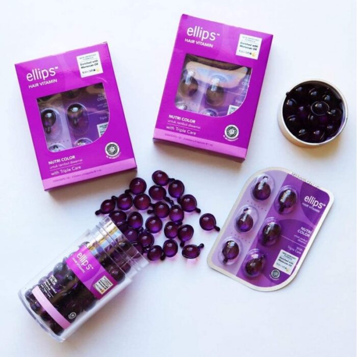 ⁦مرتبان كبسولات فيتامينات اللون البنفسجي لتغذية الشعر المصبوغ⁩ - الصورة ⁦2⁩