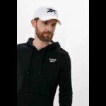 ⁦Reebok United By Fitness Baseball Hat طاقية ريبوك يونيتد باي فيتنس للجنسين لون أبيض⁩ - الصورة ⁦11⁩