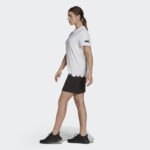 ⁦فستان نمط تيشيرت بشعار الماركة من اديداس للنساء لون أبيض وأسود Adidas Women's Sportswear Marimekko Dress⁩ - الصورة ⁦7⁩