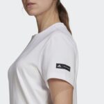 ⁦فستان نمط تيشيرت بشعار الماركة من اديداس للنساء لون أبيض وأسود Adidas Women's Sportswear Marimekko Dress⁩ - الصورة ⁦10⁩