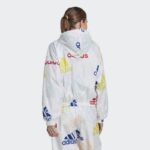 ⁦adidas Essentials Multi-Colored Logo Loose Fit Windbreaker - White⁩ - الصورة ⁦5⁩