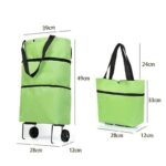 ⁦شنطة تسوق وتحمل عالأكتاف مع عجلات لون أحمر⁩ - الصورة ⁦3⁩