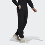 ⁦بنطلون رياضي كاجوال من اديداس للنساء لون أسود Adidas TREFOIL LINEAR SWEAT PANTS⁩ - الصورة ⁦6⁩