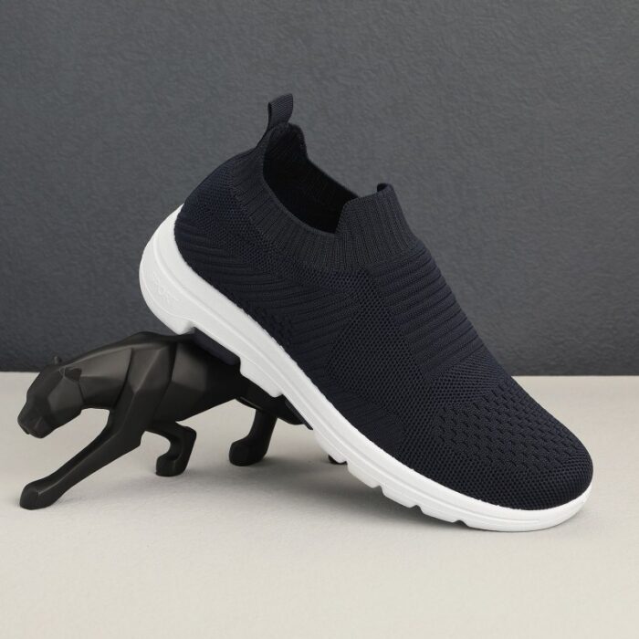 10318831_67db6c31134a7 حذاء سبورت شبابي لون كحلي - الصورة 1