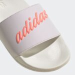 ⁦adidas Women's Adilette Shower Slide شبشب للنساء لون ابيض⁩ - الصورة ⁦10⁩