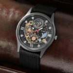 ⁦ساعة يد مسننات ملونة للجنسين حزام قماش لون أسود⁩ - الصورة ⁦3⁩