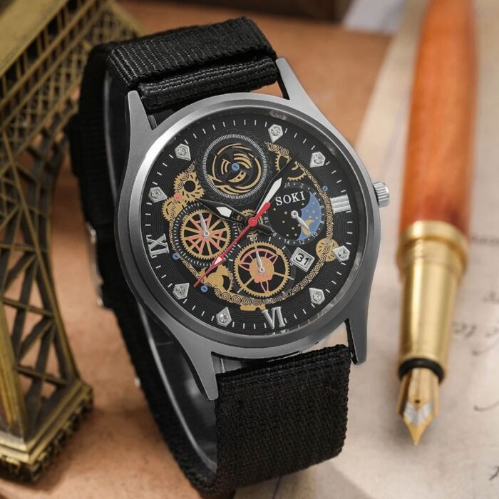 ⁦ساعة يد مسننات ملونة للجنسين حزام قماش لون أسود⁩ - الصورة ⁦4⁩