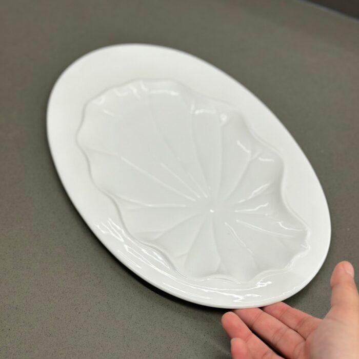 ⁦جاط بورسلان بيضاوي 33*21*1.5⁩ - الصورة ⁦4⁩