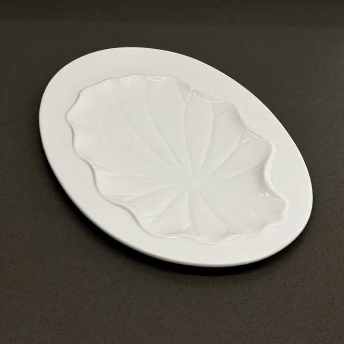 ⁦جاط بورسلان بيضاوي 33*21*1.5⁩ - الصورة ⁦6⁩