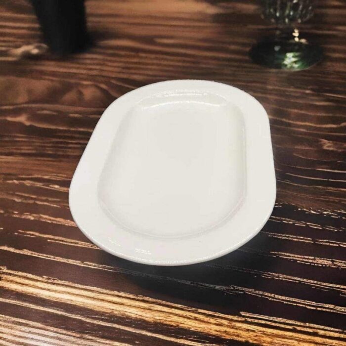 ⁦جاط بورسلان بيضاوي 36*23*3⁩ - الصورة ⁦4⁩