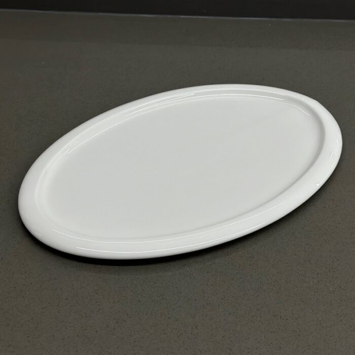 ⁦جاط بورسلان بيضاوي32.5*22*1.5⁩ - الصورة ⁦3⁩