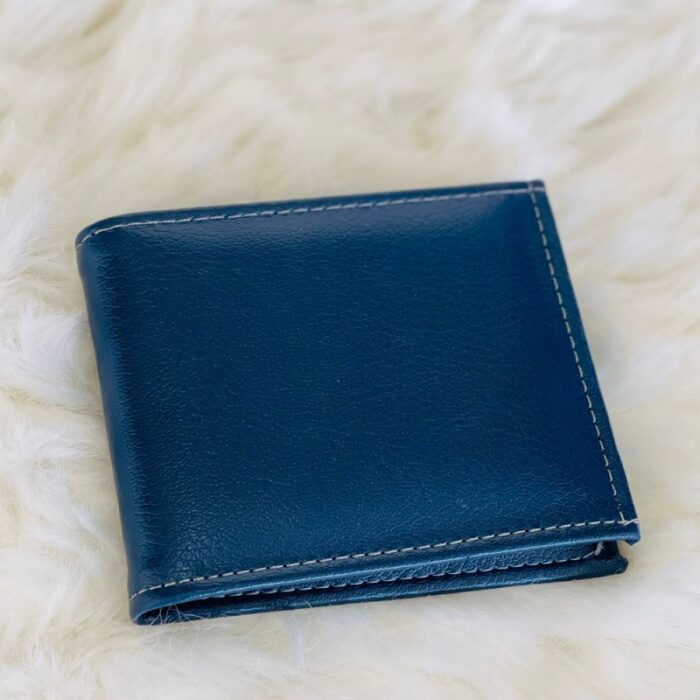 10321313_67db74e573a01 محفظة شبابية جلد سادة لون كحلي - الصورة 1