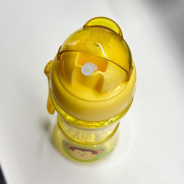 10322911_67db7aeb07150 مطرة اطفال اصفر مع مصاصة - الصورة 1