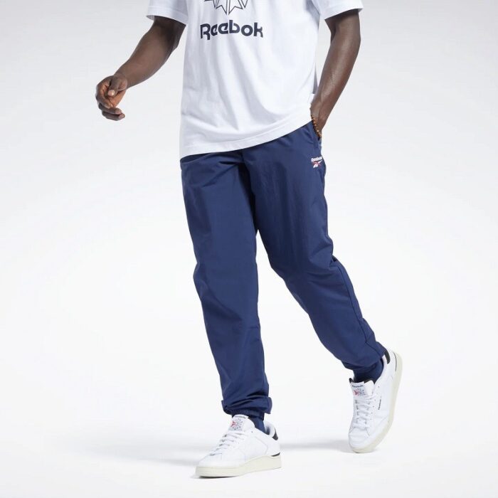 10326339_67db86c809d75 Reebok Mens' Classic Vector Track Pants بنطلون ريبوك للرجال لون أزرق - الصورة 1
