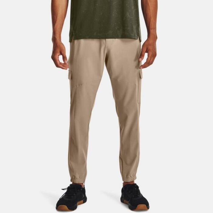 10326473_67db8744c1219 Under Armour StretchWovenCargoPants بنطال اندر ارمور ستريتش ووفن كارجو للرجاال لون بيج - الصورة 1