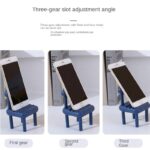 ⁦حامل جوال بلاستيك بتصميم كرسي لون أسود⁩ - الصورة ⁦3⁩