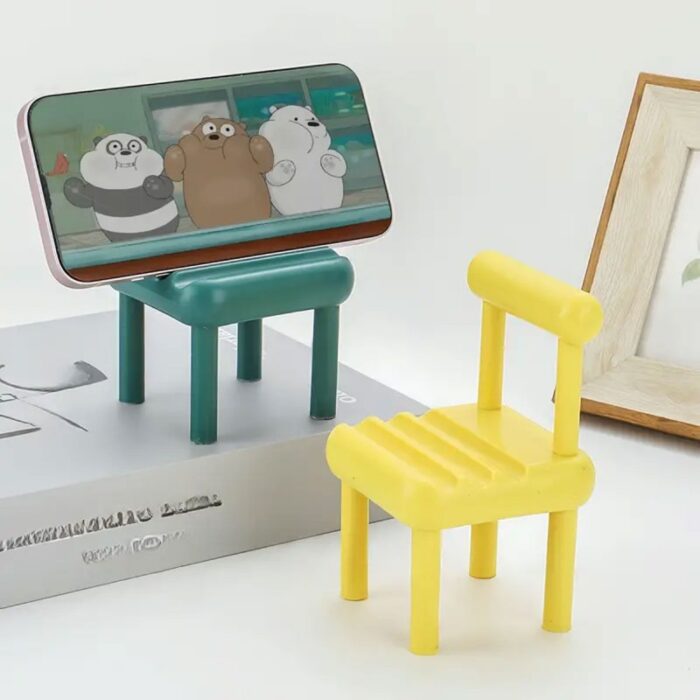 ⁦حامل جوال بلاستيك بتصميم كرسي لون أسود⁩ - الصورة ⁦4⁩