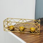 ⁦شمعدان معدن ذهبي لثلاث شمعات صغار .. قياس 26*8*8 سم⁩ - الصورة ⁦4⁩