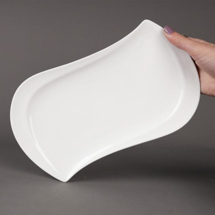 ⁦صحن بورسلان لون أبيض قياس 27.5*14.5 سم⁩ - الصورة ⁦6⁩