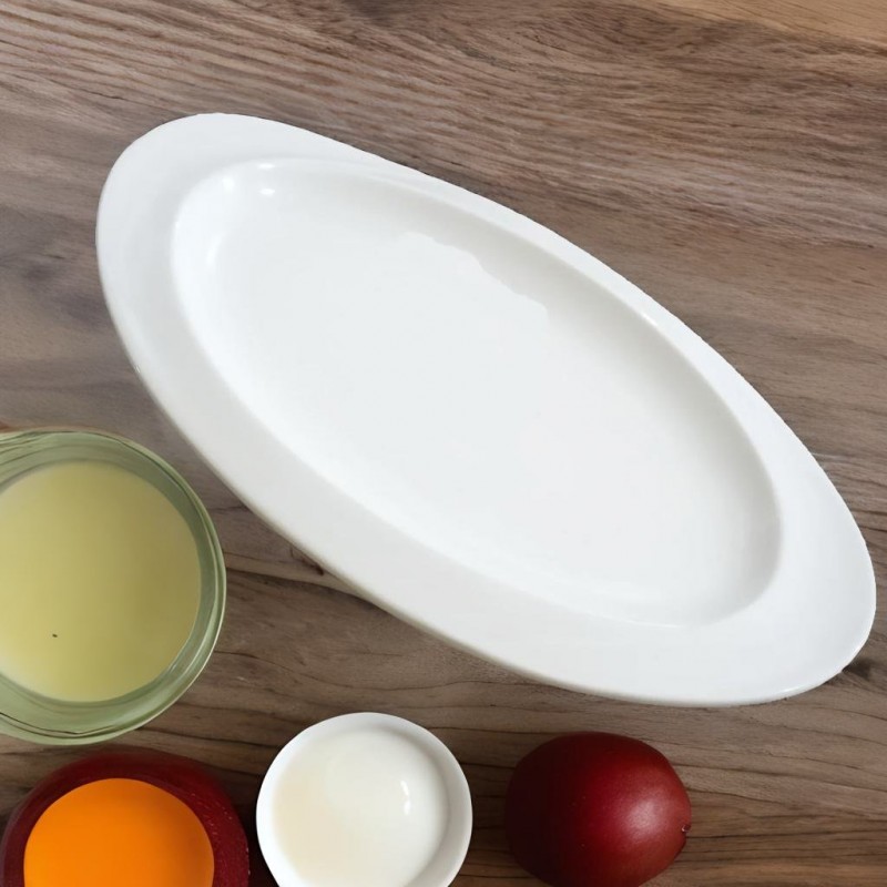 ⁦صحن بورسلان بيضاوي لون أبيض قياس 30*21 سم⁩ - الصورة ⁦1⁩