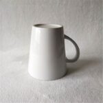 ⁦مج (كوب) بورسلان دائري مع مقبض بورسلان حجم 350 مل لون أبيض⁩ - الصورة ⁦4⁩