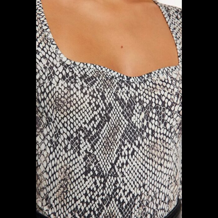 ⁦بلوزة تريندول بودي سوت للنساء بيج وأسود⁩ - الصورة ⁦4⁩