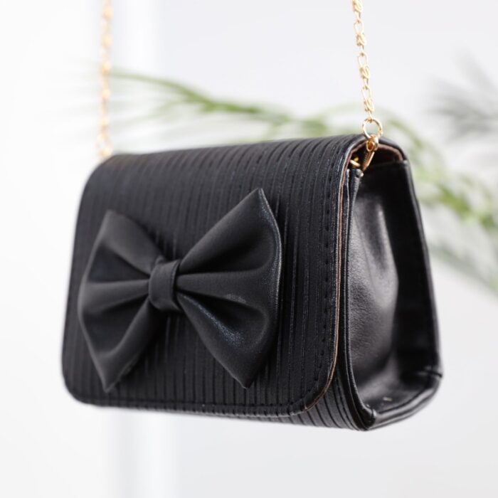 10331938_67db9d17270f9 حقيبة يد للأطفال لون أسود - الصورة 1