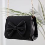 ⁦حقيبة يد للأطفال لون أسود⁩ - الصورة ⁦2⁩