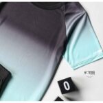 ⁦طقم رياضي (ترينغ) مُكون من قطعتين للرجال لون أسود وتركواز من Sami Boutique⁩ - الصورة ⁦2⁩