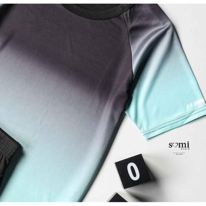 ⁦طقم رياضي (ترينغ) مُكون من قطعتين للرجال لون أسود وتركواز من Sami Boutique⁩ - الصورة ⁦2⁩