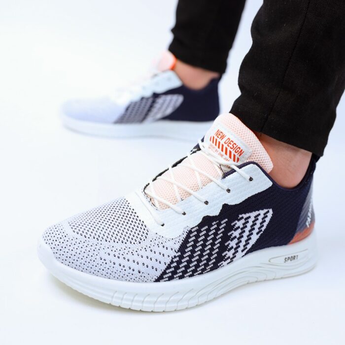 10332182_67db9e43d1bdc حذاء فاشن كاجوال جلد ونسيج للرجال لون كحلي ونعل أبيض - الصورة 1