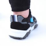 ⁦حذاء فاشن كاجوال جلد ونسيج للرجال لون أسود ونعل أبيض وأسود⁩ - الصورة ⁦2⁩