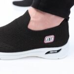 ⁦حذاء سبورت بدون أربطة للنساء لون أسود ونعل أبيض⁩ - الصورة ⁦12⁩