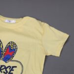 ⁦بجامة صيفية للأطفال لون أصفر فاتح وكحلي بتصميم NEVER STOP⁩ - الصورة ⁦5⁩