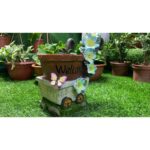 ⁦قوار العربة مع زهور مضيئة بالطاقة الشمسية⁩ - الصورة ⁦5⁩