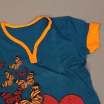 ⁦بجامة صيفية مكونة من تيشيرت وشورت للأطفال لون بترولي وبرتقالي⁩ - الصورة ⁦2⁩