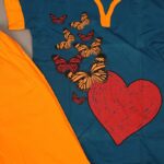 ⁦بجامة صيفية مكونة من تيشيرت وشورت للأطفال لون بترولي وبرتقالي⁩ - الصورة ⁦4⁩