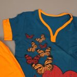 ⁦بجامة صيفية مكونة من تيشيرت وشورت للأطفال لون بترولي وبرتقالي⁩ - الصورة ⁦5⁩