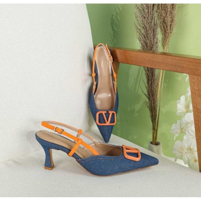 10332959_67dc4164b5d0c كندرة كعب ليفاتون جينز للنساء لون أزرق وبرتقالي - الصورة 1