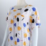 ⁦فستان بيتي صيفي للنساء لون أبيض بتصميم دوائر ملونة⁩ - الصورة ⁦2⁩