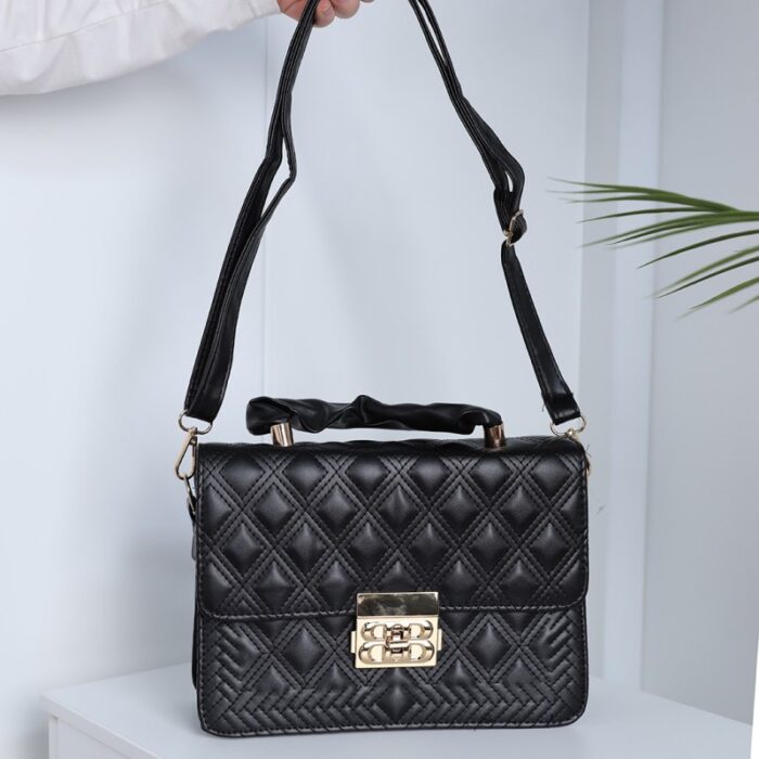 10333965_67dc475fe6812 شنطة كتف لون اسود - الصورة 1